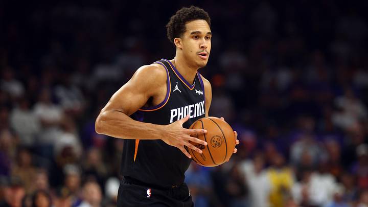 Apr 17, 2026; Phoenix, Arizona, USA; Phoenix Suns forward Oso Ighodaro (11) against the Golden State Warriors during the play-in rounds of the 2026 NBA Playoffs at Mortgage Matchup Center. Mandatory Credit: Mark J. Rebilas-Imagn Images Apr 17, 2026; Phoenix, Arizona, USA; Phoenix Suns forward Oso Ighodaro (11) against the Golden State Warriors during the play-in rounds of the 2026 NBA Playoffs at Mortgage Matchup Center. Mandatory Credit: Mark J. Rebilas-Imagn Images