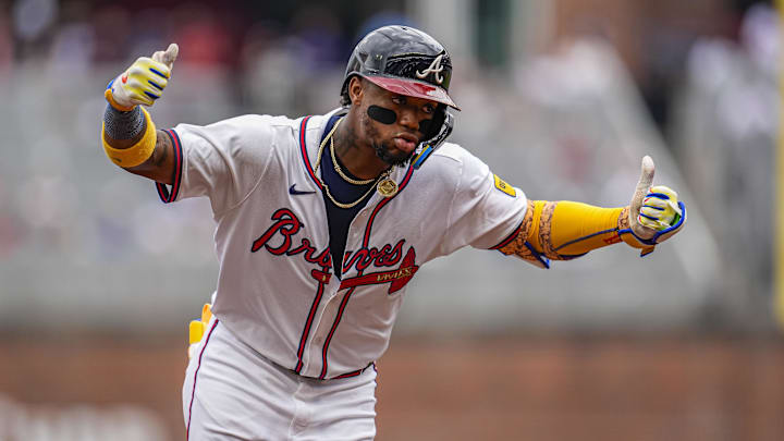 Jun 5, 2025; Cumberland, Georgia, USA; Atlanta Braves right fielder Ronald Acuna Jr (13) reacts after hitting a home run against the Arizona Diamondbacks during the sixth inning at Truist Park. Mandatory Credit: Dale Zanine-Imagn Images