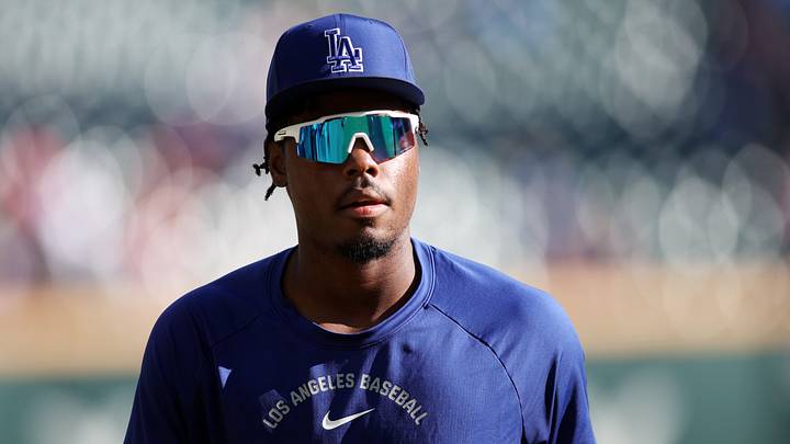 Oct 6, 2026; Cumberland, Georgia, USA; Los Angeles Dodgers outfielder Josue De Paula (95) warms up prior to a game against the Atlanta Braves in game three of the NLDS for the 2026 MLB playoffs at Truist Park. Mandatory Credit: Brett Davis-Imagn Images