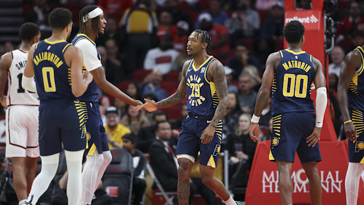 Nov 20, 2024; Houston, Texas, USA; Indiana Pacers guard Quenton Jackson (29) celebrates with center Myles Turner (33) after scoring during the first quarter against the Houston Rockets at Toyota Center. Mandatory Credit: Troy Taormina-Imagn Images