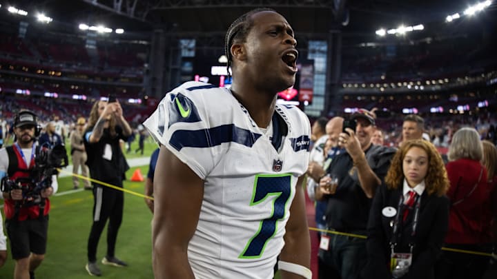 Dec 8, 2024; Glendale, Arizona, USA; Seattle Seahawks quarterback Geno Smith (7) celebrates after defeating the Arizona Cardinals at State Farm Stadium.