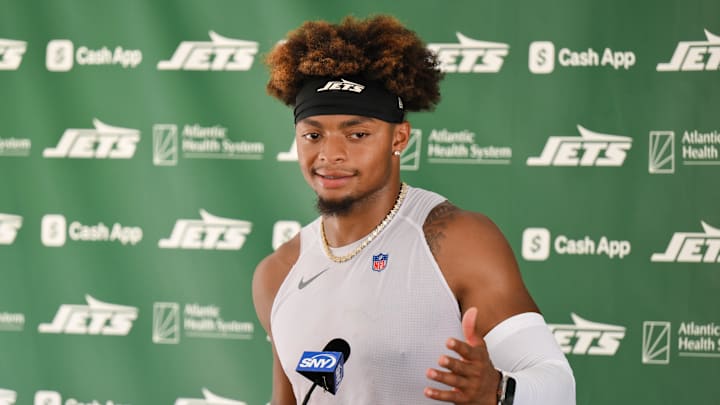 Jul 23, 2025; Florham Park, NY, USA; New York Jets quarterback Justin Fields (7) speaks at a press conference during training camp at Atlantic Health Jets Training Center. Mandatory Credit: John Jones-Imagn Images