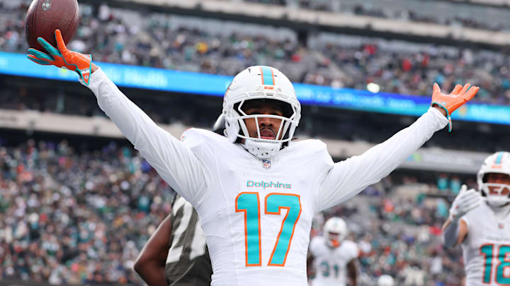 Dec 7, 2025; East Rutherford, New Jersey, USA; Miami Dolphins wide receiver Jaylen Waddle (17) reacts after making a catch for a touchdown against the New York Jets during the first half at MetLife Stadium. Dec 7, 2025; East Rutherford, New Jersey, USA; Miami Dolphins wide receiver Jaylen Waddle (17) reacts after making a catch for a touchdown against the New York Jets during the first half at MetLife Stadium.