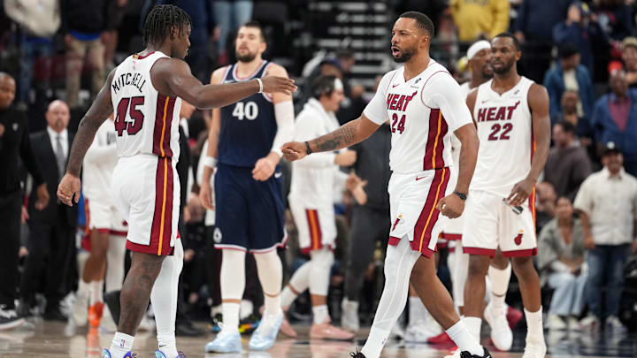 Nov 3, 2025; Inglewood, California, USA; Miami Heat guard Norman Powell (24) celebrates with guard Davion Mitchell (45) at the end of the game against the LA Clippers at Intuit Dome. Mandatory Credit: Kirby Lee-Imagn Images