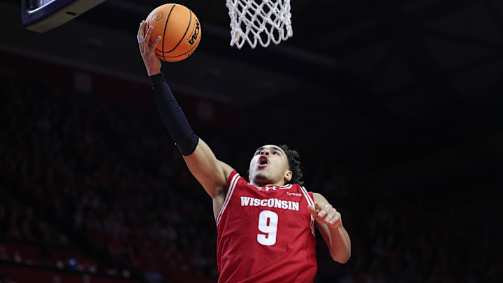 Jan 6, 2025; Piscataway, New Jersey, USA; Wisconsin Badgers guard John Tonje (9) goes to the basket during the first half against the Rutgers Scarlet Knights at Jersey Mike's Arena. Mandatory Credit: Vincent Carchietta-Imagn Images
