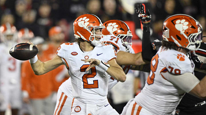 Nov 14, 2025; Louisville, Kentucky, USA;  Clemson Tigers quarterback Cade Klubnik (2) looks to pass against the Louisville Cardinals during the second half at L&N Federal Credit Union Stadium. Clemson defeated Louisville 20-19. Mandatory Credit: Jamie Rhodes-Imagn Images