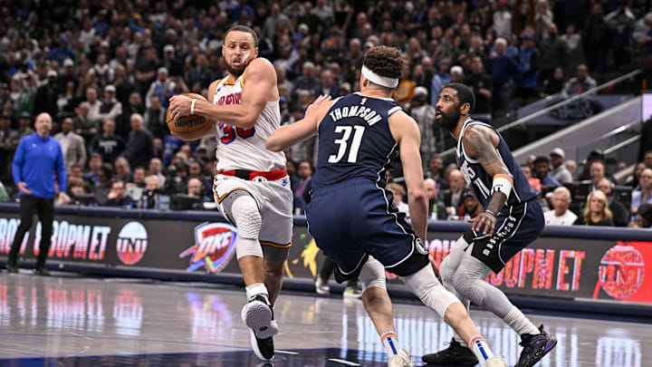 Golden State Warriors guard Stephen Curry (30) and Dallas Mavericks guard Klay Thompson (31) in action during the game between the Dallas Mavericks and the Golden State Warriors at the American Airlines Center. Mandatory Credit: Jerome Miron-Imagn Images