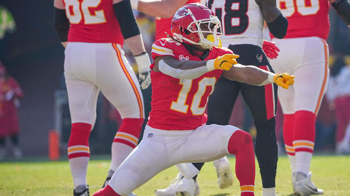Dec 21, 2024; Kansas City, Missouri, USA; Kansas City Chiefs running back Isiah Pacheco (10) celebrates after a play against the Houston Texans during the first half at GEHA Field at Arrowhead Stadium. Mandatory Credit: Denny Medley-Imagn Images