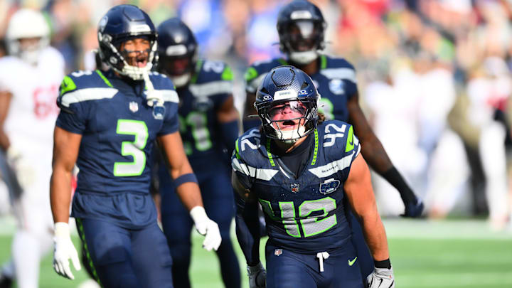 Nov 9, 2025; Seattle, Washington, USA; Seattle Seahawks linebacker Drake Thomas (42) celebrates a defensive stop during the first quarter against the Arizona Cardinals at Lumen Field.