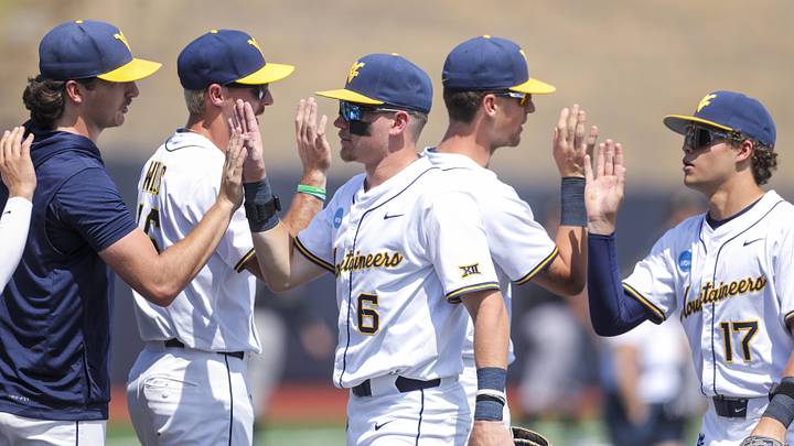 West Virginia is favored against Troy in the first round of the College World Series.