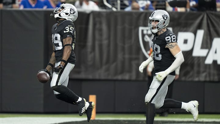 November 5, 2023; Paradise, Nevada, USA; Las Vegas Raiders cornerback Nate Hobbs (39) and defensive end Maxx Crosby (98) celebrate after an interception by Hobbs against the New York Giants during the second quarter at Allegiant Stadium. Mandatory Credit: Kyle Terada-USA TODAY Sports November 5, 2023; Paradise, Nevada, USA; Las Vegas Raiders cornerback Nate Hobbs (39) and defensive end Maxx Crosby (98) celebrate after an interception by Hobbs against the New York Giants during the second quarter at Allegiant Stadium. Mandatory Credit: Kyle Terada-USA TODAY Sports