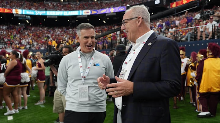 Sep 1, 2024; Paradise, Nevada, USA; Big 10 commissioner Tony Petitti (left) and SEC commissioner Greg Sankey attend the game between the LSU Tigers and the Southern California Trojans at Allegiant Stadium.