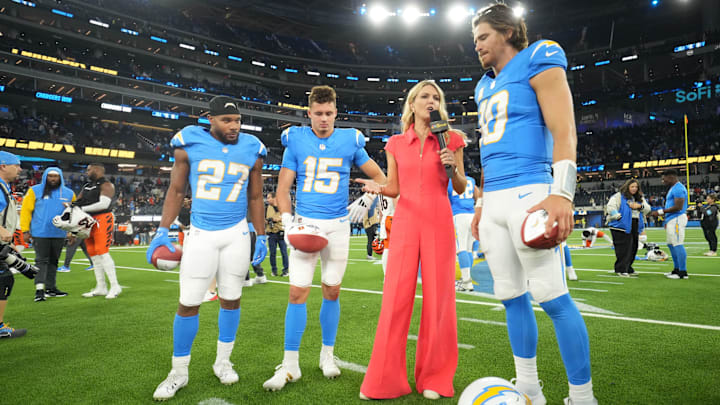 Los Angeles Chargers QB Justin Herbert, RB J.K. Dobbins, and WR Ladd McConkey after the game against the Bengals.