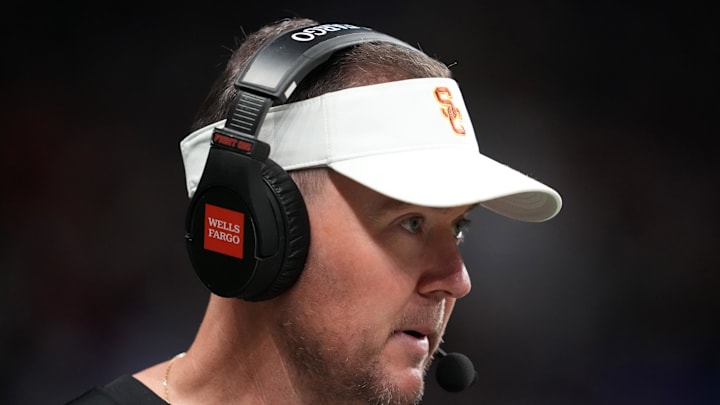 Dec 30, 2025; San Antonio, TX, USA; Southern California Trojans head coach Lincoln Riley watches in the first half against the TCU Horned Frogs during the Alamo Bowl at Alamodome. Mandatory Credit: Kirby Lee-Imagn Images