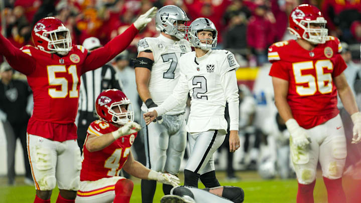 Nov 29, 2024; Kansas City, Missouri, USA; Las Vegas Raiders place kicker Daniel Carlson (2) reacts after missing a field goal during the second half against the Kansas City Chiefs at GEHA Field at Arrowhead Stadium. Mandatory Credit: Jay Biggerstaff-Imagn Images