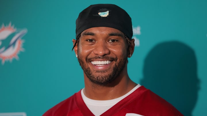 Miami Dolphins quarterback Tua Tagovailoa (1) speaks to reporters during training camp at Baptist Health Training Complex. 