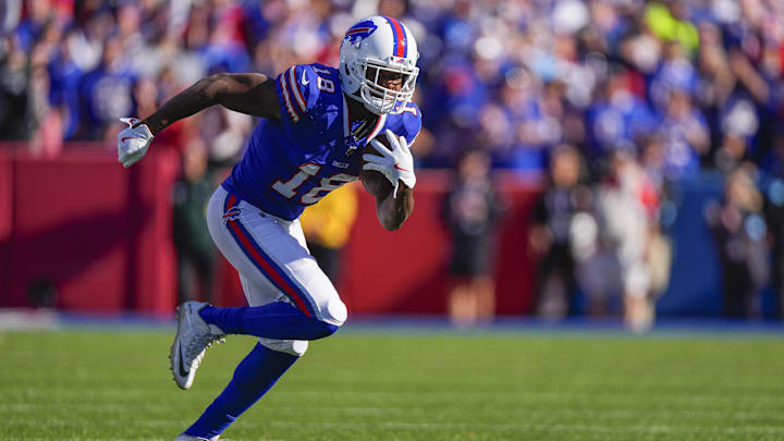Oct 20, 2024; Orchard Park, New York, USA; Buffalo Bills wide receiver Amari Cooper (18) runs with the ball after making a catch against the Tennessee Titans during the second half at Highmark Stadium. Mandatory Credit: Gregory Fisher-Imagn Images Oct 20, 2024; Orchard Park, New York, USA; Buffalo Bills wide receiver Amari Cooper (18) runs with the ball after making a catch against the Tennessee Titans during the second half at Highmark Stadium. Mandatory Credit: Gregory Fisher-Imagn Images