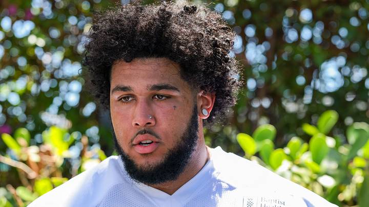 Miami Dolphins guard Kadyn Proctor (74) speaks to reporters during rookie minicamp at the Baptist Health Training Complex. Miami Dolphins guard Kadyn Proctor (74) speaks to reporters during rookie minicamp at the Baptist Health Training Complex.