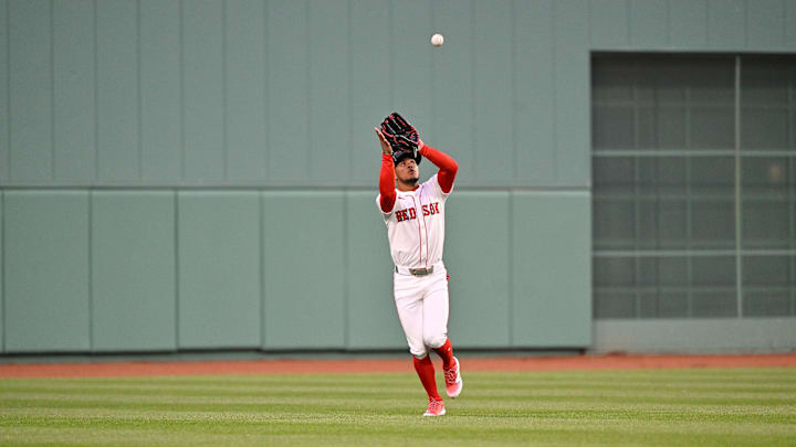 Apr 10, 2025; Boston, Massachusetts, USA; Boston Red Sox center fielder Ceddanne Rafaela (3) makes a catch for an out against the Toronto Blue Jays during the tenth inning at Fenway Park. Mandatory Credit: Eric Canha-Imagn Images Apr 10, 2025; Boston, Massachusetts, USA; Boston Red Sox center fielder Ceddanne Rafaela (3) makes a catch for an out against the Toronto Blue Jays during the tenth inning at Fenway Park. Mandatory Credit: Eric Canha-Imagn Images