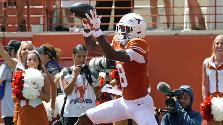Sep 5, 2026; Austin, Texas, USA;  Texas Longhorns wide receiver Cam Coleman (8) catches a pass for a touchdown during the first quarter against the Texas State Bobcats at Darrell K Royal-Texas Memorial Stadium.  Mandatory Credit: Scott Wachter-Imagn Images