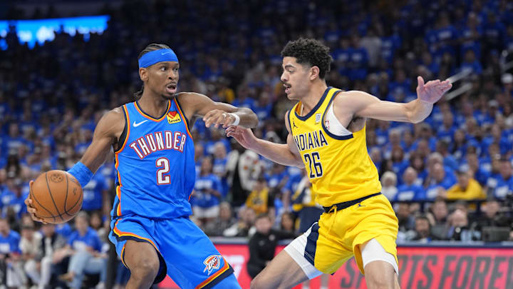 Jun 8, 2025; Oklahoma City, Oklahoma, USA; Oklahoma City Thunder guard Shai Gilgeous-Alexander (2) dribbles the ball against Indiana Pacers guard Ben Sheppard (26) during the second half during game two of the 2025 NBA Finals at Paycom Center. Mandatory Credit: Kyle Terada-Imagn Images Jun 8, 2025; Oklahoma City, Oklahoma, USA; Oklahoma City Thunder guard Shai Gilgeous-Alexander (2) dribbles the ball against Indiana Pacers guard Ben Sheppard (26) during the second half during game two of the 2025 NBA Finals at Paycom Center. Mandatory Credit: Kyle Terada-Imagn Images