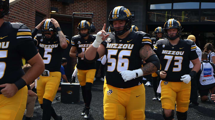 Sep 6, 2025; Columbia, Missouri, USA; Missouri Tigers offensive lineman Dominick Giudice takes the field ahead of the renewed Border Showdown between the Tigers and Kansas Jayhawks at Faurot Field at Memorial Stadium.