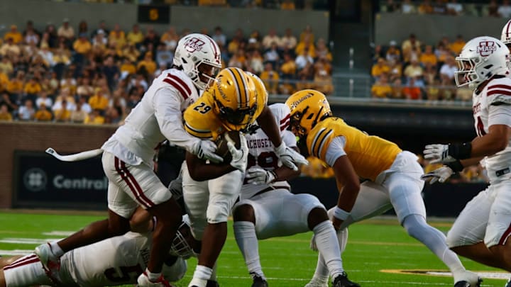 Sept 27, 2025; Columbia, Missouri, USA; Missouri Tigers running back Ahmad Hardy fights through contact on a rush in a game against UMass at Faurot Field at Memorial Stadium. Sept 27, 2025; Columbia, Missouri, USA; Missouri Tigers running back Ahmad Hardy fights through contact on a rush in a game against UMass at Faurot Field at Memorial Stadium.