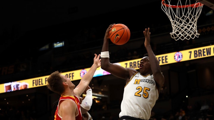 Nov 9, 2025; Columbia, Missouri, USA; Missouri Tigers forward Mark Mitchell goes up for a layup against the VMI Keydets at Mizzou Arena. Nov 9, 2025; Columbia, Missouri, USA; Missouri Tigers forward Mark Mitchell goes up for a layup against the VMI Keydets at Mizzou Arena.