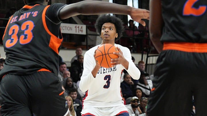 Stepinac’s Adonis Ratliff (3) puts up a shot against Saint Raymonds during the CHSAA AA city championship game at Fordham University in the Bronx March 9, 2025. Stepinac won the game in overtime 63-61. Stepinac’s Adonis Ratliff (3) puts up a shot against Saint Raymonds during the CHSAA AA city championship game at Fordham University in the Bronx March 9, 2025. Stepinac won the game in overtime 63-61.