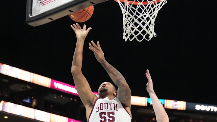 South Carolina basketball guard Ta'Lon Cooper drives to the basket against Virginia Tech.