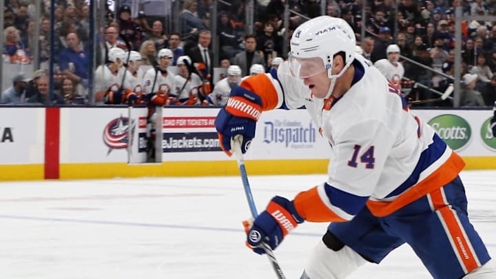 Apr 17, 2025; Columbus, Ohio, USA; New York Islanders center Bo Horvat (14) wrists a shot on goal against the Columbus Blue Jackets during the third period at Nationwide Arena. Mandatory Credit: Russell LaBounty-Imagn Images