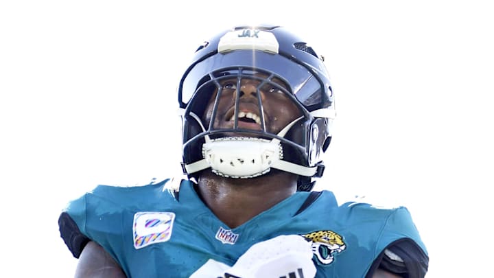 Oct 27, 2024; Jacksonville, Florida, USA; Jacksonville Jaguars defensive end Josh Hines-Allen (41) celebrates an interception by his team during the first half against the Green Bay Packers at EverBank Stadium. Mandatory Credit: Melina Myers-Imagn Images