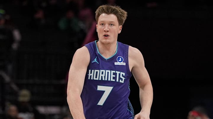 Nov 2, 2025; Charlotte, North Carolina, USA; Charlotte Hornets guard Kon Knueppel (7) brings the ball up court against the Utah Jazz during the first quarter at Spectrum Center. Mandatory Credit: Jim Dedmon-Imagn Images