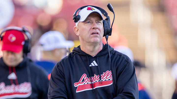 Nov 16, 2024; Stanford, California, USA; Louisville Cardinals head coach Jeff Brohm walks on the sidelines during the fourth quarter against the Stanford Cardinal at Stanford Stadium. 