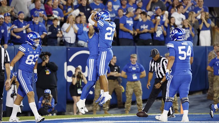 Chase Roberts and LJ Martin celebrate in the endzone
