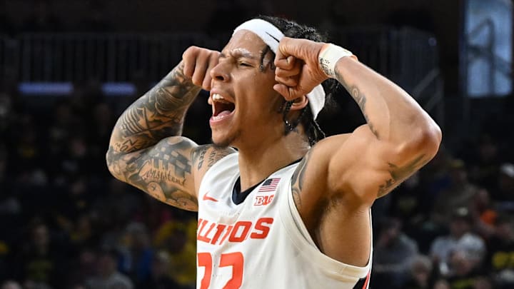 Mar 2, 2025; Ann Arbor, Michigan, USA; Illinois Fighting Illini guard Tre White (22) reacts after the Fighting Illini hit a three point shot against the Michigan Wolverines in the second half at Crisler Center. Mandatory Credit: Lon Horwedel-Imagn Images Mar 2, 2025; Ann Arbor, Michigan, USA; Illinois Fighting Illini guard Tre White (22) reacts after the Fighting Illini hit a three point shot against the Michigan Wolverines in the second half at Crisler Center. Mandatory Credit: Lon Horwedel-Imagn Images