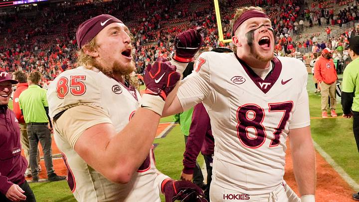 Virginia Tech Hokies tight end Luke Reynolds (85), who had two touchdowns including the game-winner, celebrates a 20-16 Hokies win with teammate Harrison Saint Germain (87) after the game at Memorial Stadium. Virginia Tech Hokies tight end Luke Reynolds (85), who had two touchdowns including the game-winner, celebrates a 20-16 Hokies win with teammate Harrison Saint Germain (87) after the game at Memorial Stadium.