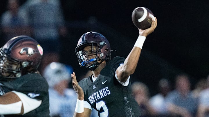 Lipscomb's Deuce Knight (2) throws downfield against IMG at Lipscomb's Reese Smith Football Field in Nashville, Tenn., Friday night, Aug. 18, 2023.