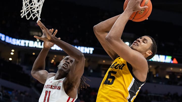 Mar 11, 2022; Indianapolis, IN, USA; Iowa Hawkeyes forward Keegan Murray (15) and Rutgers Scarlet Knights center Clifford Omoruyi (11) fight for a rebound in the second half at Gainbridge Fieldhouse. Mandatory Credit: Trevor Ruszkowski-Imagn Images Mar 11, 2022; Indianapolis, IN, USA; Iowa Hawkeyes forward Keegan Murray (15) and Rutgers Scarlet Knights center Clifford Omoruyi (11) fight for a rebound in the second half at Gainbridge Fieldhouse. Mandatory Credit: Trevor Ruszkowski-Imagn Images