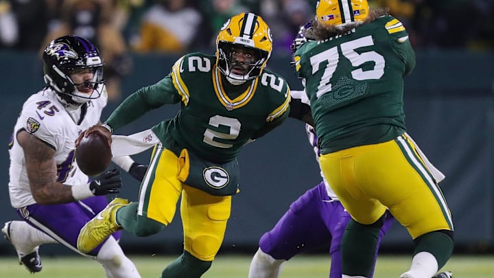 Green Bay Packers quarterback Malik Willis (2) scrambles against the Baltimore Ravens on Saturday, December 27, 2025, at Lambeau Field in Green Bay, Wis. 