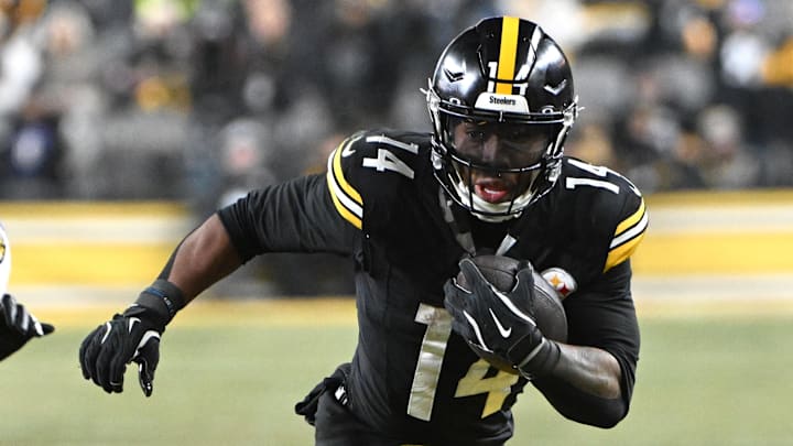 Jan 4, 2026; Pittsburgh, Pennsylvania, USA; Pittsburgh Steelers running back Kenneth Gainwell (14) runs  against the Baltimore Ravens during the first half at Acrisure Stadium. Mandatory Credit: Barry Reeger-Imagn Images