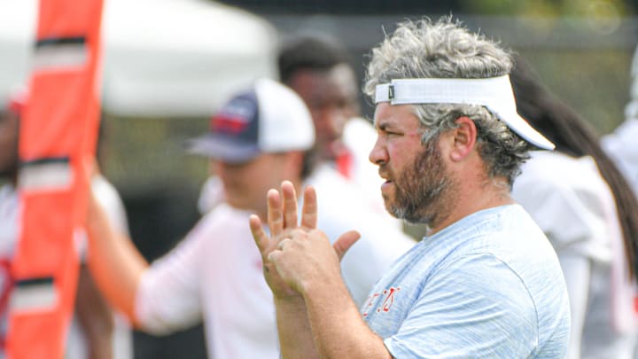 Ole Miss defensive coordinator Pete Golding signals during football practice in Oxford, Miss. on