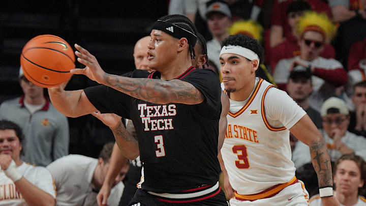 Texas Tech Red Raiders forward LeJuan Watts (3) passes the ball around Texas Tech Red Raiders forward LeJuan Watts (3) during the second half in the Big-12 conference men’s basketball showdown on Feb. 28, 2026, at Hilton Coliseum in Ames, Iowa.