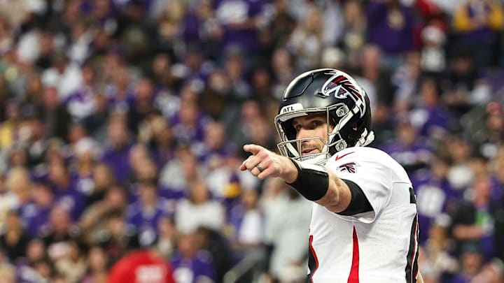 Dec 8, 2024; Minneapolis, Minnesota, USA; Atlanta Falcons quarterback Kirk Cousins (18) celebrates running back Bijan Robinson's (7) touchdown against the Minnesota Vikings during the third quarter at U.S. Bank Stadium. Mandatory Credit: Matt Krohn-Imagn Images Dec 8, 2024; Minneapolis, Minnesota, USA; Atlanta Falcons quarterback Kirk Cousins (18) celebrates running back Bijan Robinson's (7) touchdown against the Minnesota Vikings during the third quarter at U.S. Bank Stadium. Mandatory Credit: Matt Krohn-Imagn Images