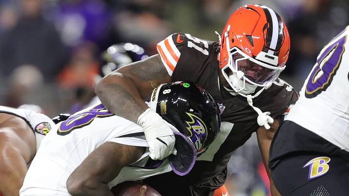 Cleveland Browns defensive tackle Mike Hall Jr. (51) wraps up Baltimore Ravens quarterback Lamar Jackson (8) during the second half of an NFL football game at Huntington Bank Field, Nov. 16, 2025, in Cleveland, Ohio. Cleveland Browns defensive tackle Mike Hall Jr. (51) wraps up Baltimore Ravens quarterback Lamar Jackson (8) during the second half of an NFL football game at Huntington Bank Field, Nov. 16, 2025, in Cleveland, Ohio.