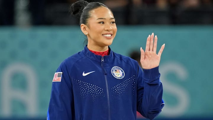 Sunisa Lee of the United States waves after winning the bronze medal on the second day of gymnastics event finals during the Paris 2024 Olympic Summer Games at Bercy Arena.