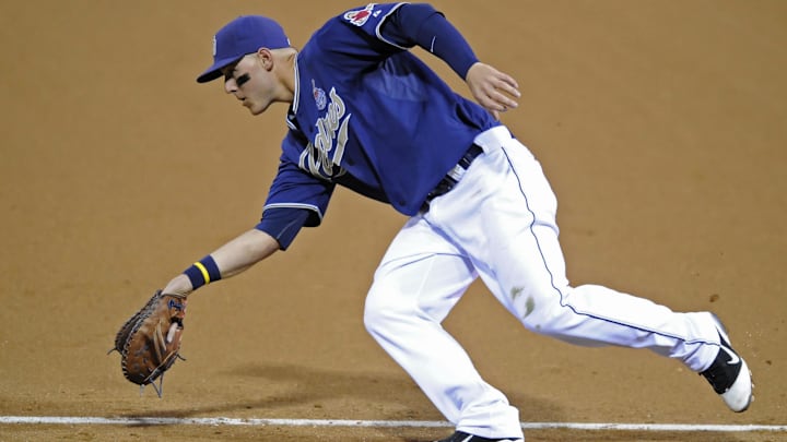 San Diego Padres first baseman Anthony Rizzo (27) fields a ground ball during the seventh inning against the Chicago Cubs at Petco Park on Sept. 28, 2011.