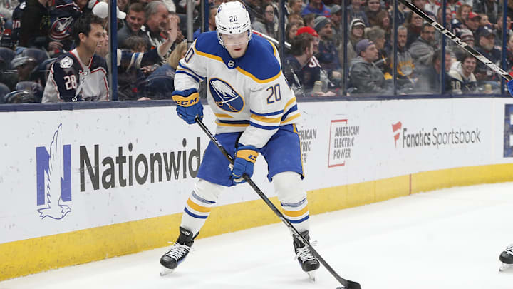 Apr 10, 2025; Columbus, Ohio, USA; Buffalo Sabres center Jiri Kulich (20) picks up a loose puck against the Columbus Blue Jackets during the first period at Nationwide Arena. Mandatory Credit: Russell LaBounty-Imagn Images Apr 10, 2025; Columbus, Ohio, USA; Buffalo Sabres center Jiri Kulich (20) picks up a loose puck against the Columbus Blue Jackets during the first period at Nationwide Arena. Mandatory Credit: Russell LaBounty-Imagn Images