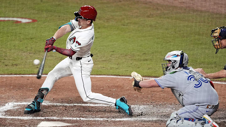 Jul 15, 2025; Cumberland, Georgia, USA; National League outfielder Corbin Carroll (7) of the Arizona Diamondbacks hits a solo home run during the sixth inning during the 2025 MLB All Star Game at Truist Park. Mandatory Credit: Dale Zanine-Imagn Images