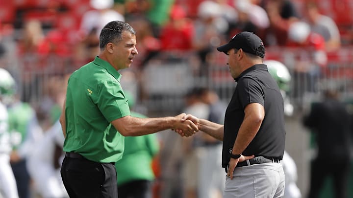 Sep 11, 2021; Columbus, Ohio, USA; Oregon Ducks head coach Mario Cristobal and Ohio State Buckeyes head coach Ryan Day before the game at Ohio Stadium. Mandatory Credit: Joseph Maiorana-Imagn Images Sep 11, 2021; Columbus, Ohio, USA; Oregon Ducks head coach Mario Cristobal and Ohio State Buckeyes head coach Ryan Day before the game at Ohio Stadium. Mandatory Credit: Joseph Maiorana-Imagn Images